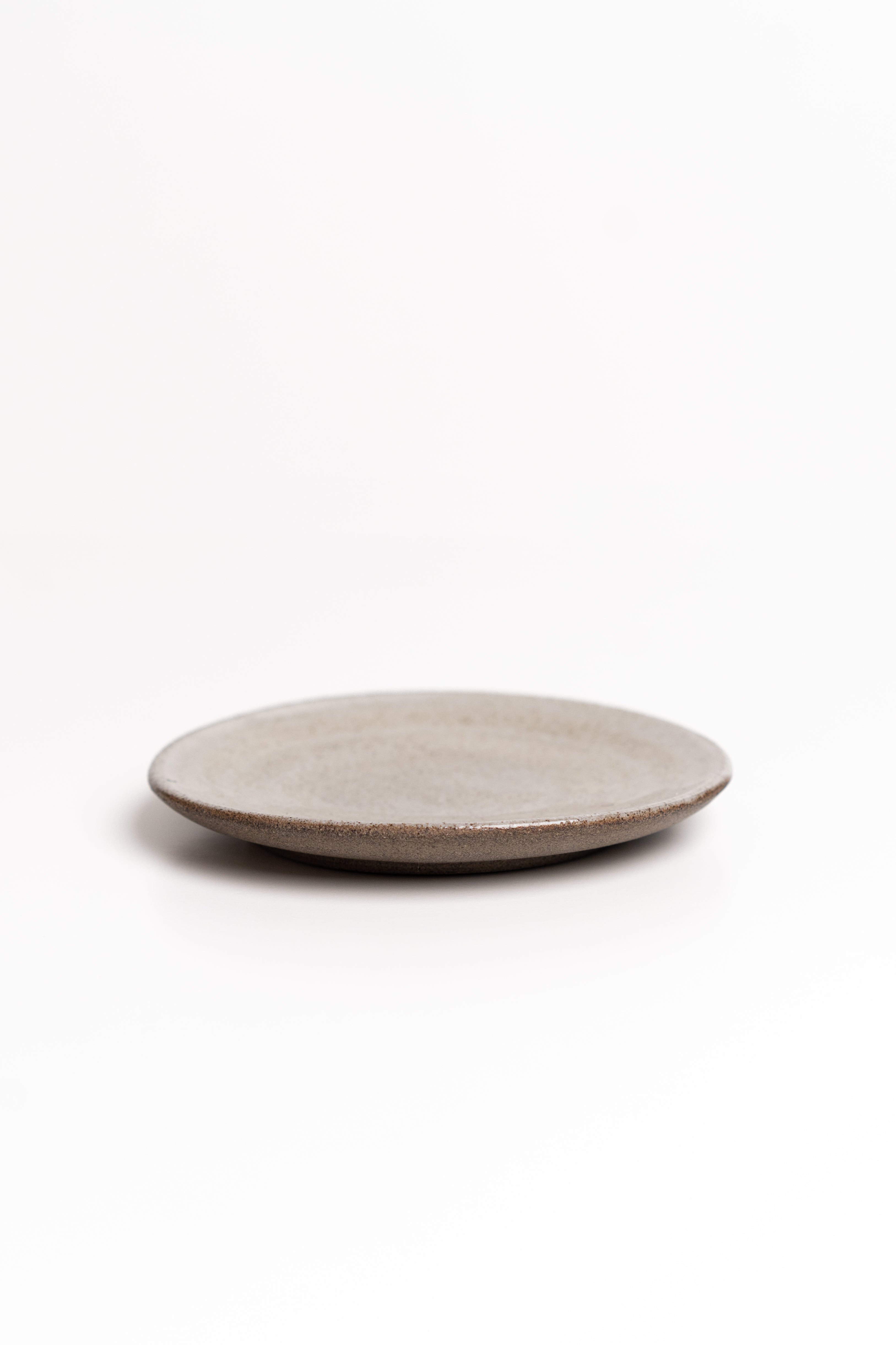 Round ceramic dish on a white background