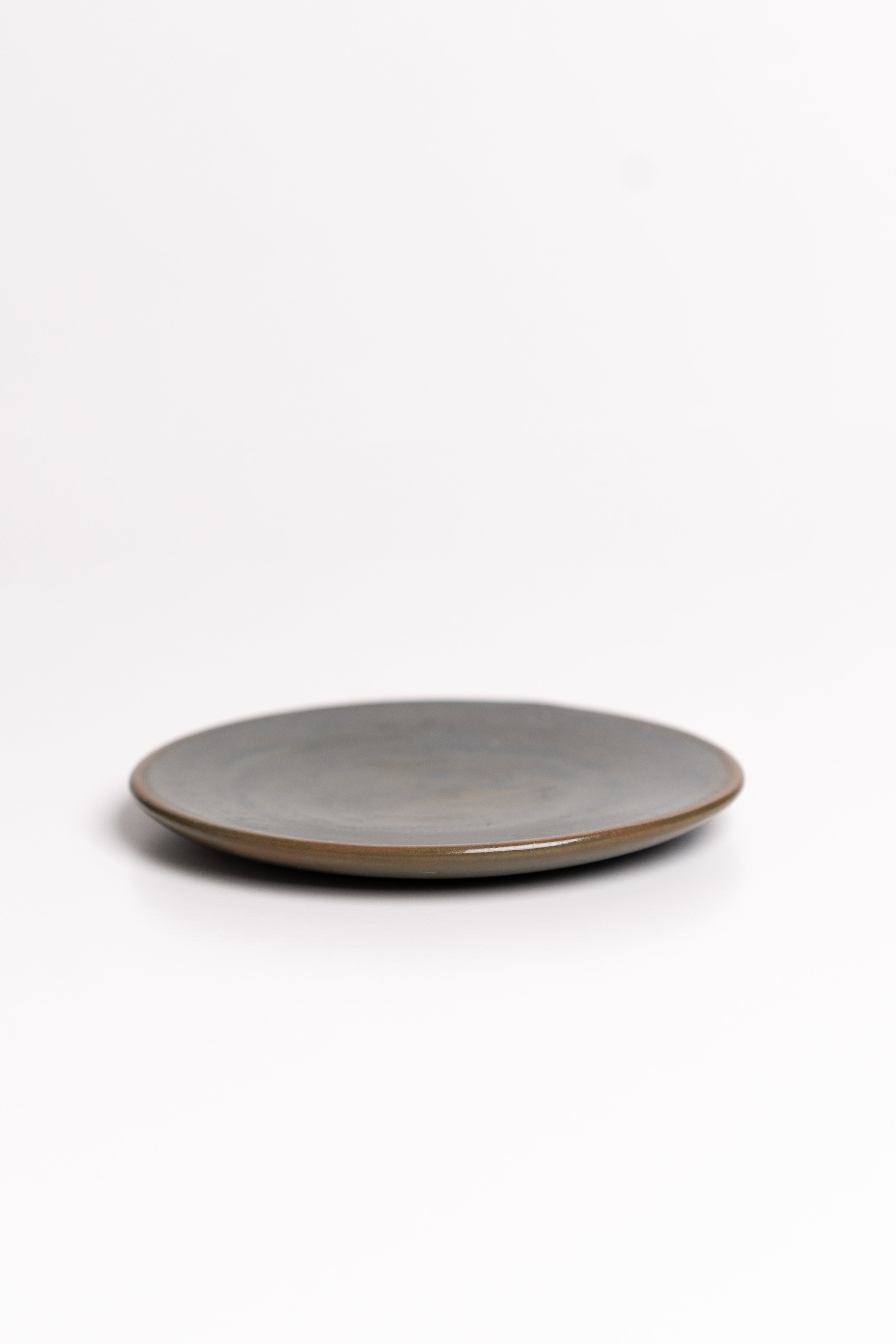 Round ceramic dish on a white background