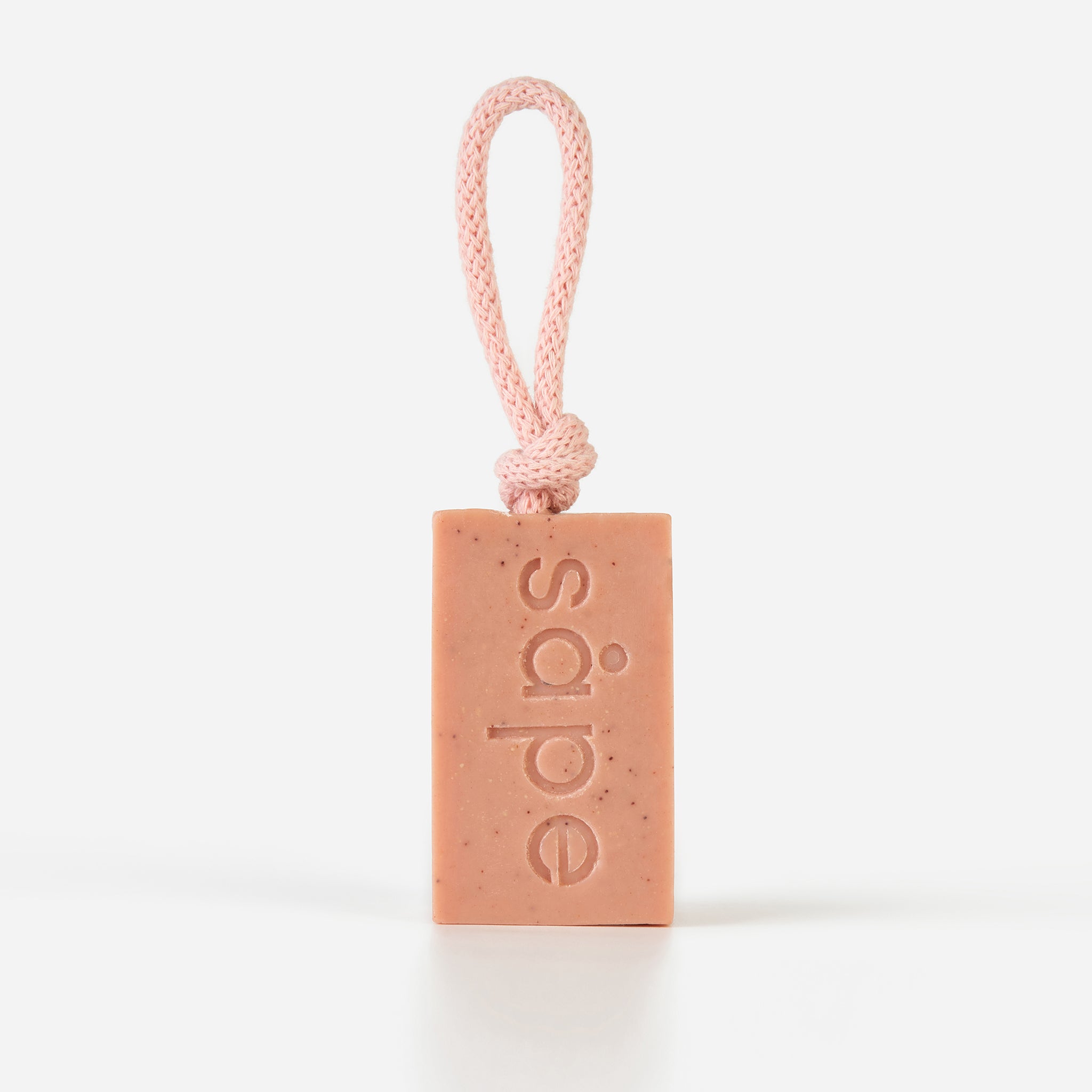 Front view of Drøm pink clay soap on a rope – floral handmade soap bar for daily use