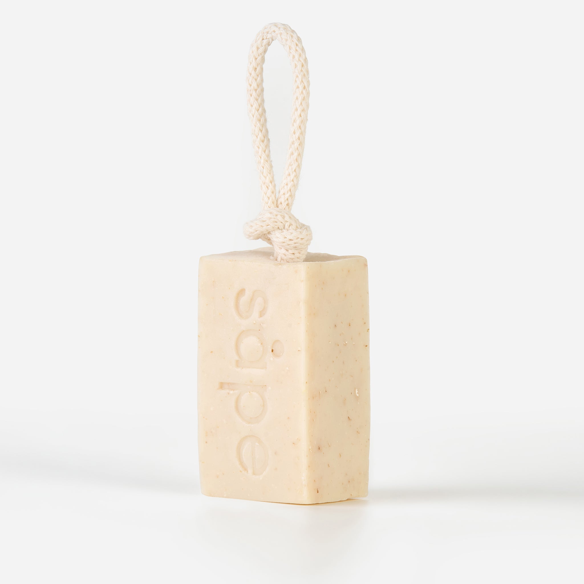Side view of Havre oatmeal soap showing gentle exfoliating texture and rope