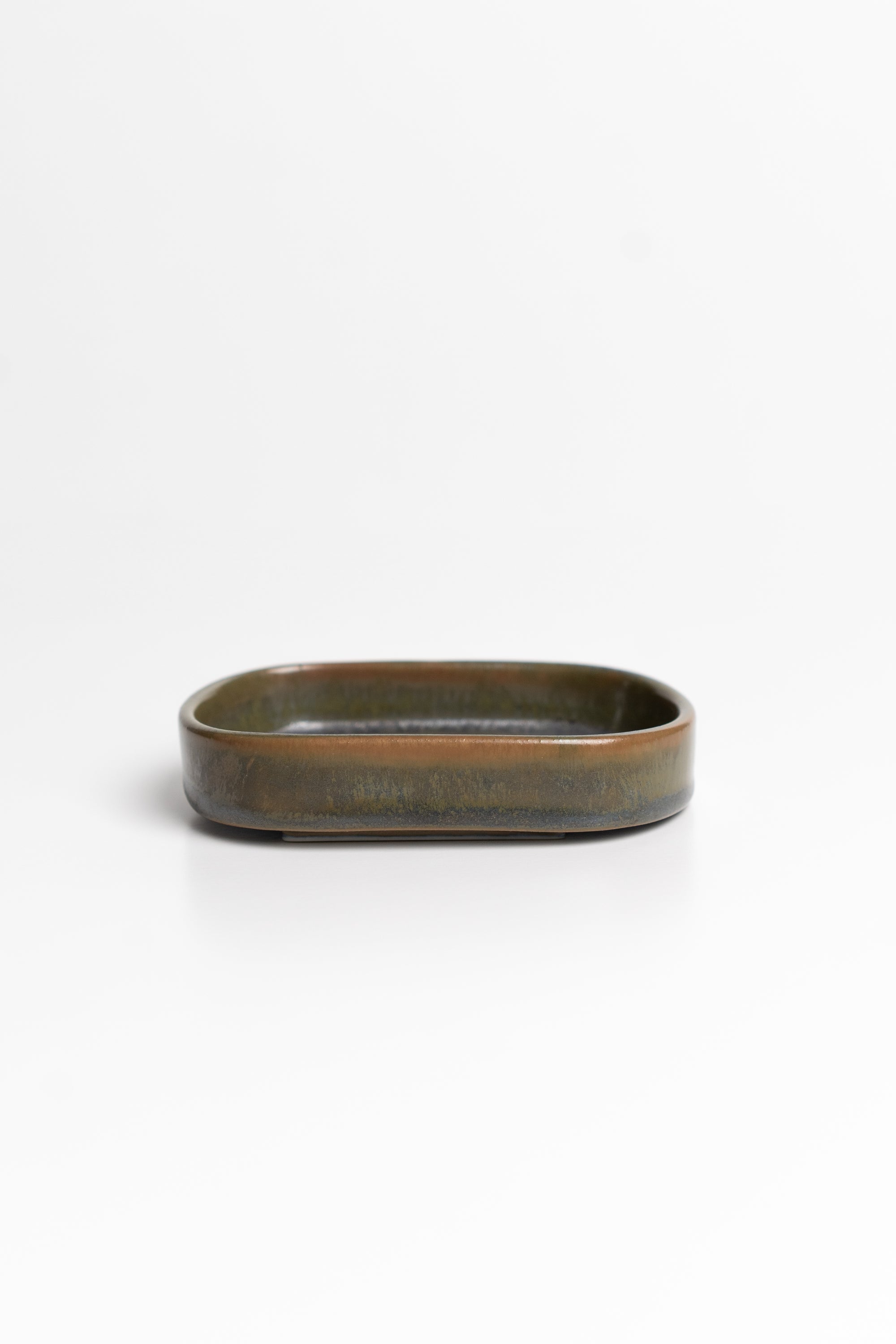 Oval ceramic dish on a white background