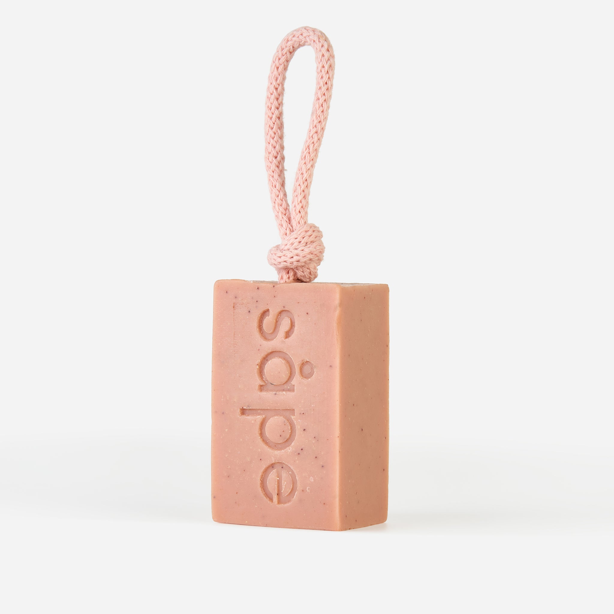 Side view of Drøm soap showing rope loop and subtle clay colouring